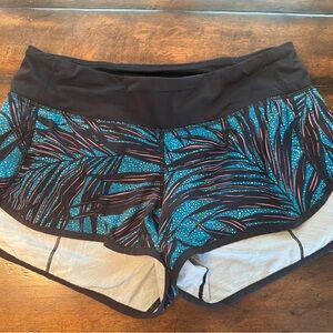 Women's Lululemon Black and Teal Patterned Speed Shorts- Size 6